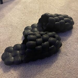 I am selling my Men's Cushioned EVA Massage Slippers.